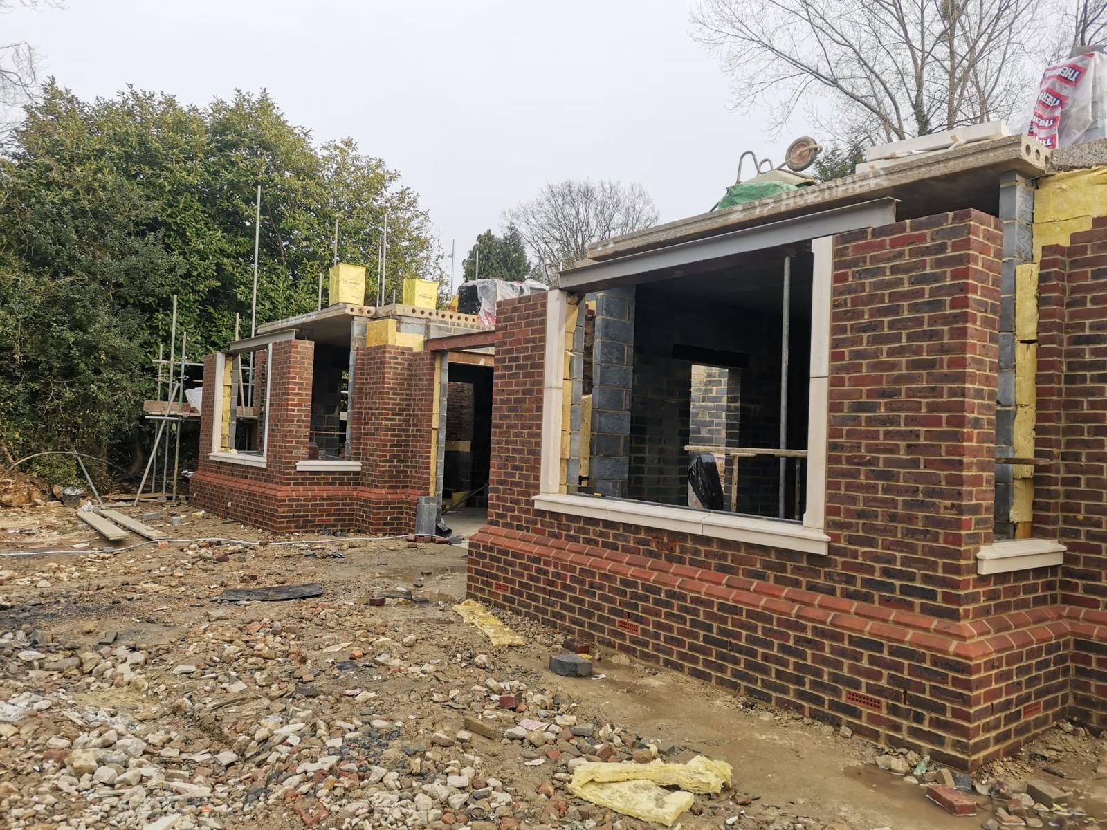 New build brickwork with detailed window surrounds and brick detailing