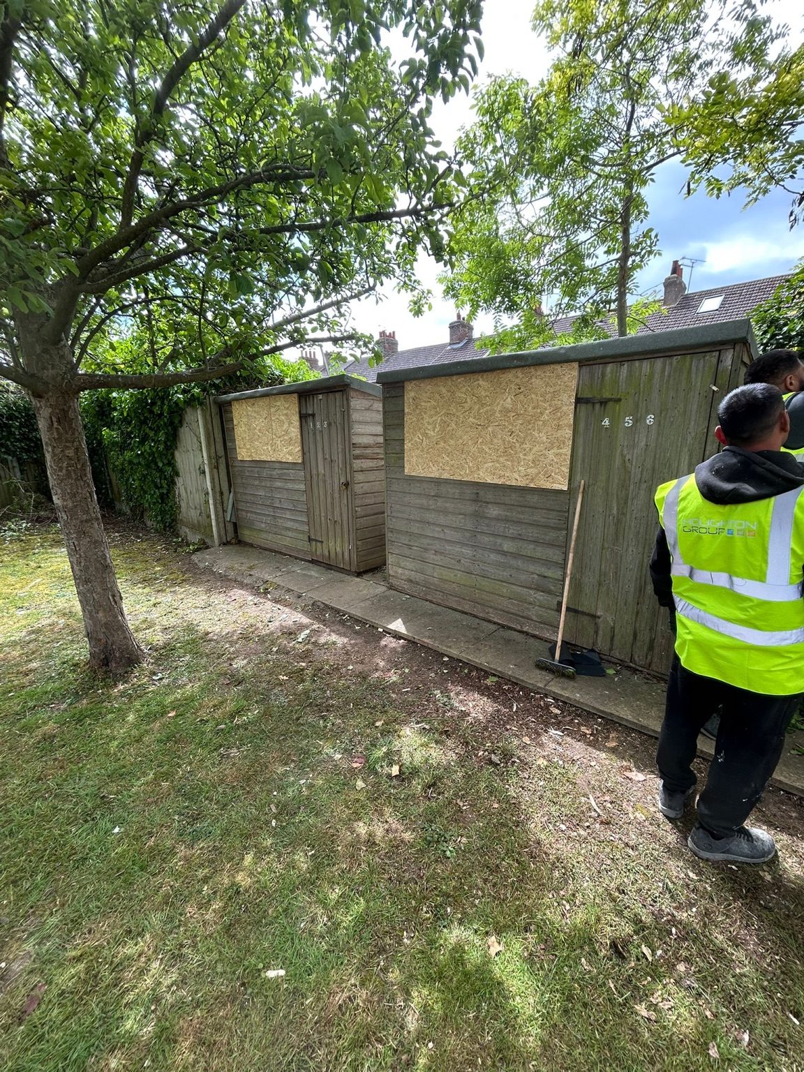 Boarding works to timber garden structures