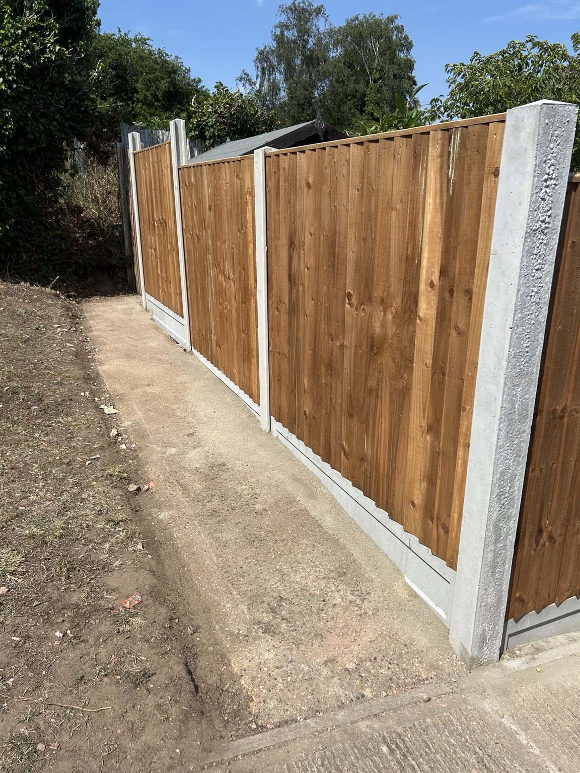 Close view of completed timber boundary fencing