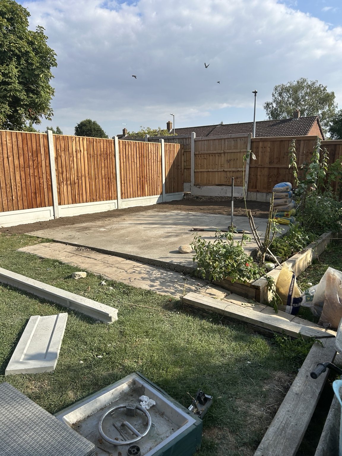 New timber fencing and concrete base