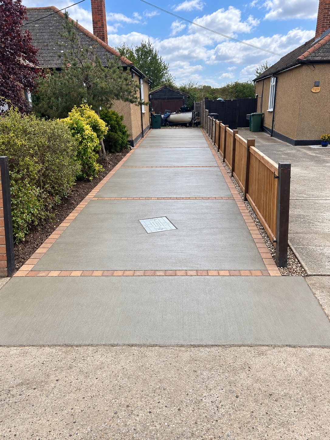 Concrete driveway with brick edging