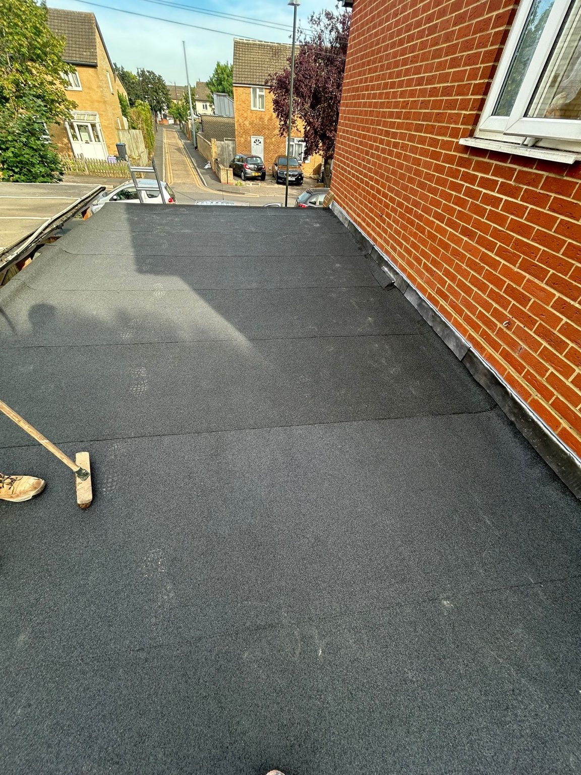 Completed flat roof with new edge detailing