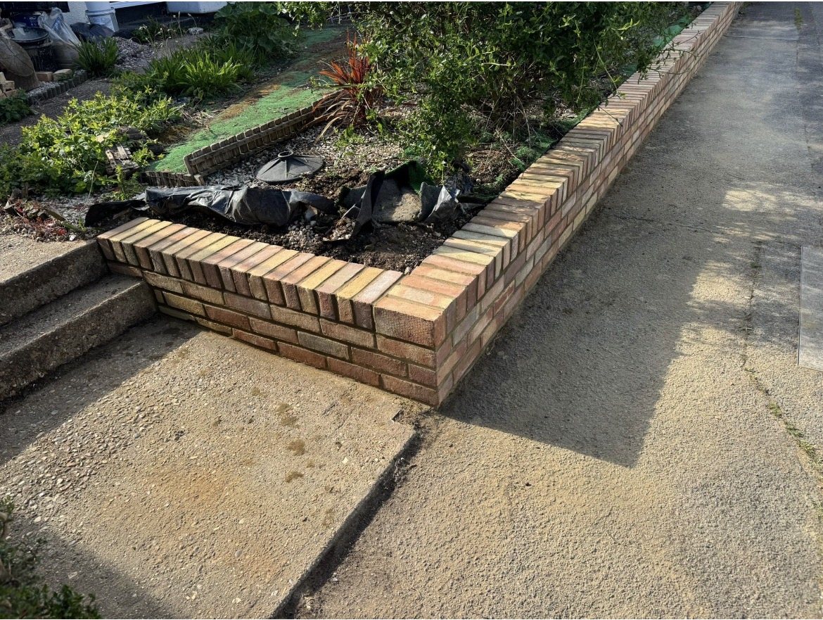 Detailed brick garden wall